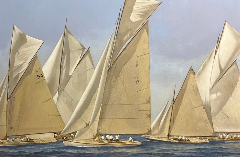 several sailboats gearing up for a race