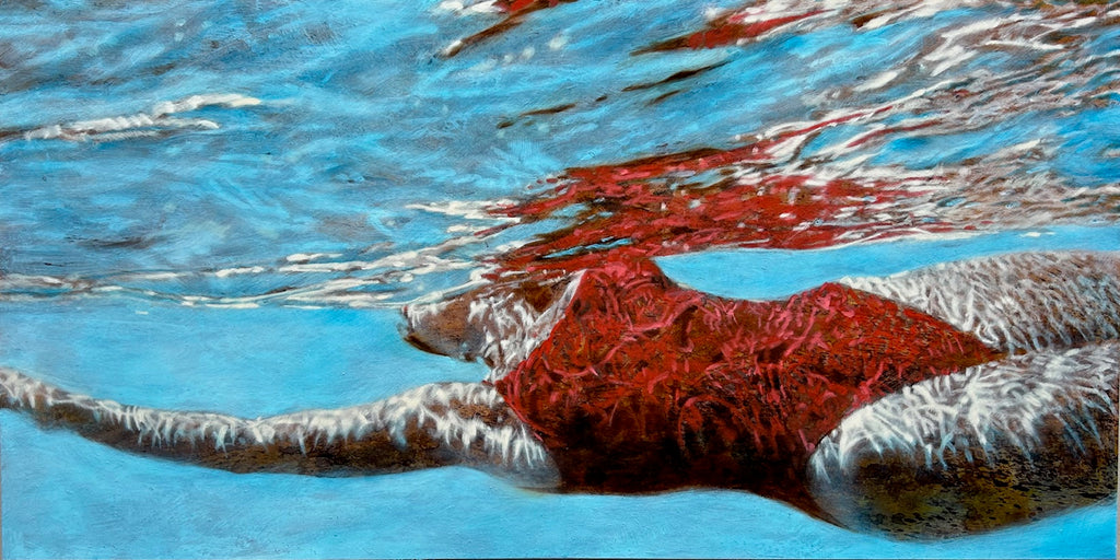 large, bright blue painting of a woman in a red bathing suit, gliding beneath the surface of the water.