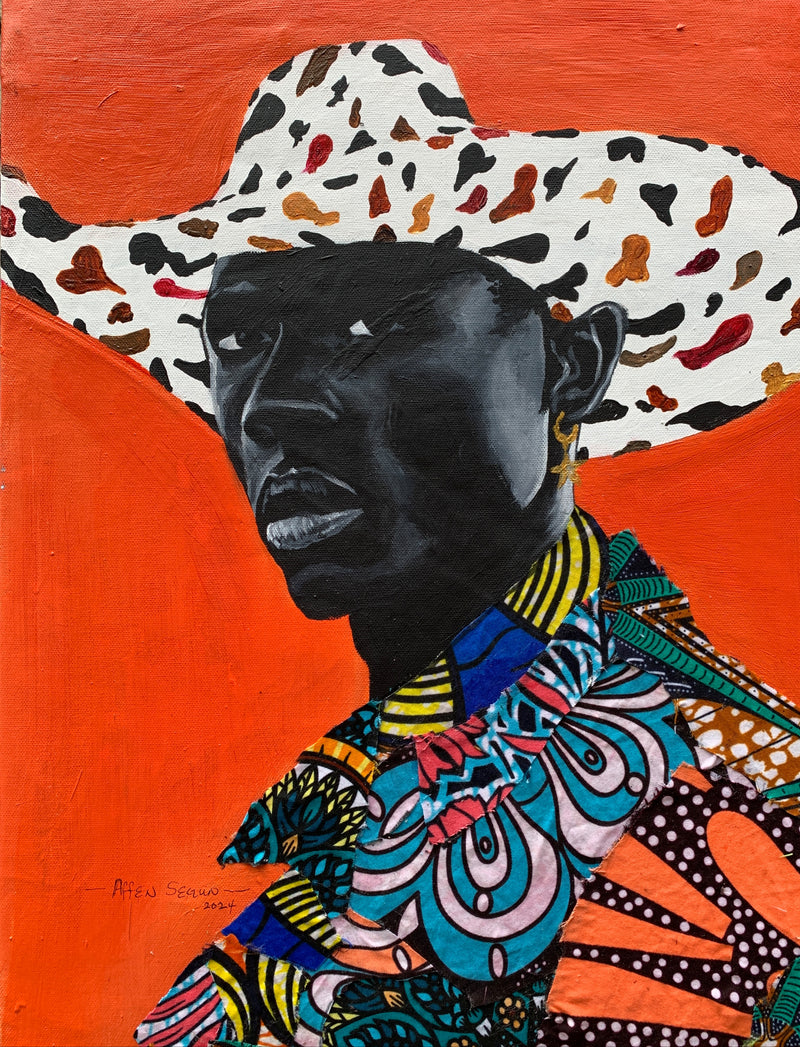 A man with a colorful shirt and cowboy hat faces forward with his head held high